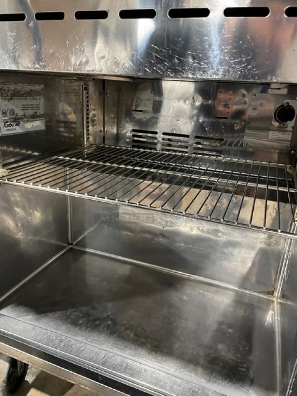 Turbo Air TST-28SD-12 Refrigerated Prep Table, stainless steel, includes chrome-plated rack, on casters, 115V, 1 Phase.