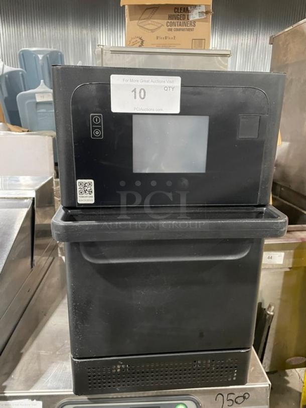 MerryChef Eikon E2S commercial black countertop rapid cook oven, electric, 208/240V, 1 phase, late model, on legs.