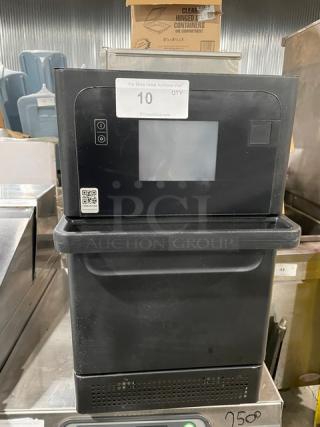 MerryChef Eikon E2S commercial black countertop rapid cook oven, electric, 208/240V, 1 phase, late model, on legs.