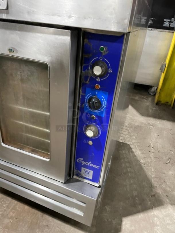 Bakers Pride Cyclone CO11G1 double convection oven, stainless steel, natural gas/electric, on casters, with wired rack.