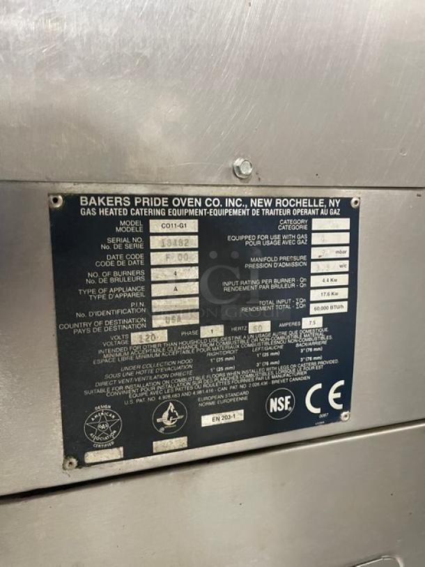 Bakers Pride Cyclone Series stainless steel convection oven label, Model CO11-G1, SN 18482, detailing specs and certifications.