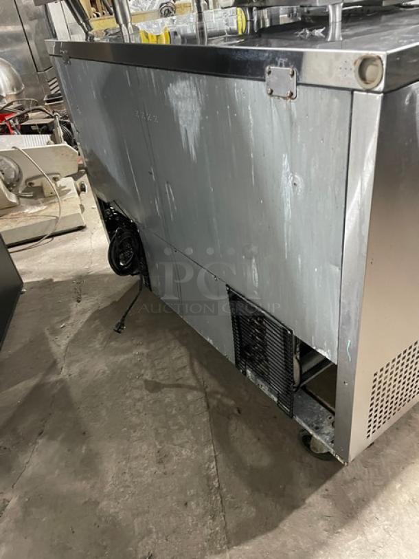 Turbo Air M3 Series MUF-48 commercial stainless steel undercounter worktop freezer, Energy Star certified, on casters.