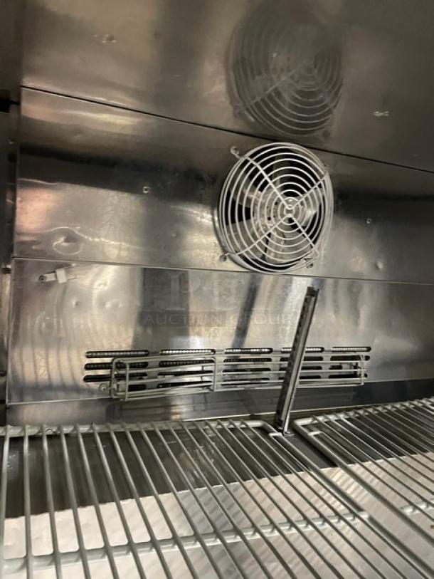Turbo Air M3 Series MUF-48 undercounter freezer interior featuring poly coated wired rack, fan, and stainless steel finish.