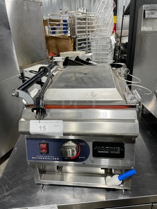 Waring Commercial stainless steel electric pasta cooker, model WPC100, 208/240V, countertop design with control panel and markings.