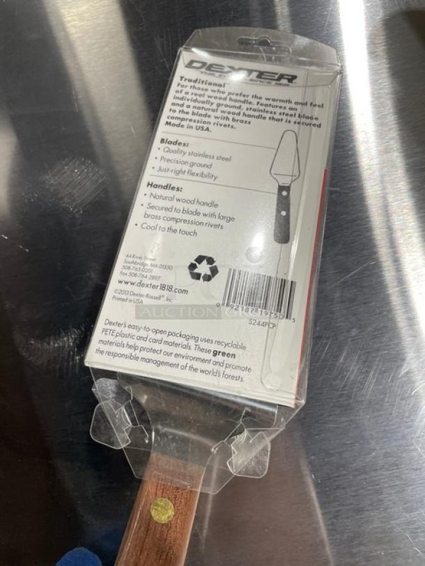 Brand new Dexter Russell S244 pie knife, 4-1/2"x2-1/4" stainless steel blade, natural rosewood handle, in original packaging.