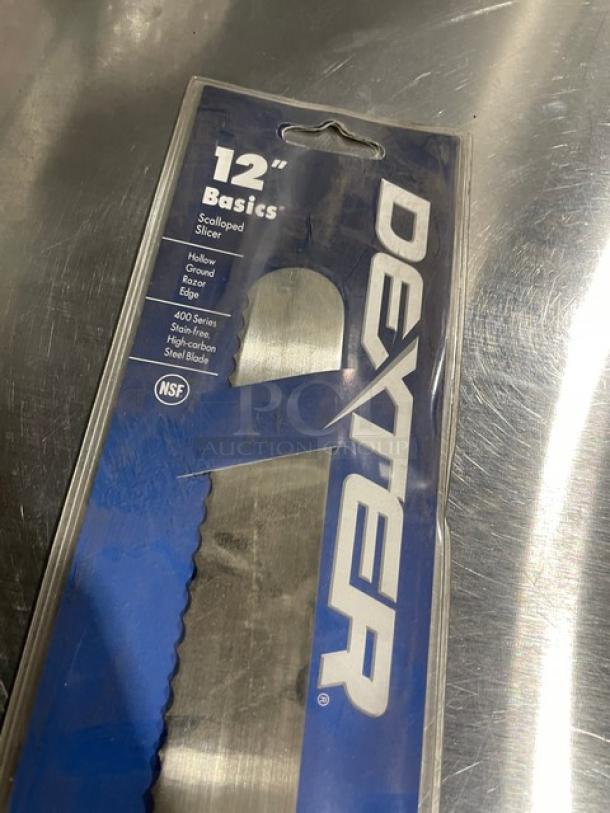 Dexter Russell Basics Series 12" Scalloped Slicer, stainless steel blade, white grip, new in packaging, NSF certified.