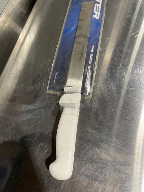Brand new Dexter Russell 12" scalloped slicer, stainless steel blade, white grip handle, Basics Series, in original packaging.