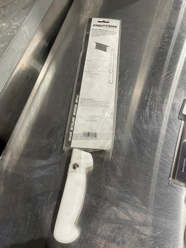 Dexter Russell Basics 12" scalloped slicer, stainless steel, white grip handle, brand new in packaging with product details.