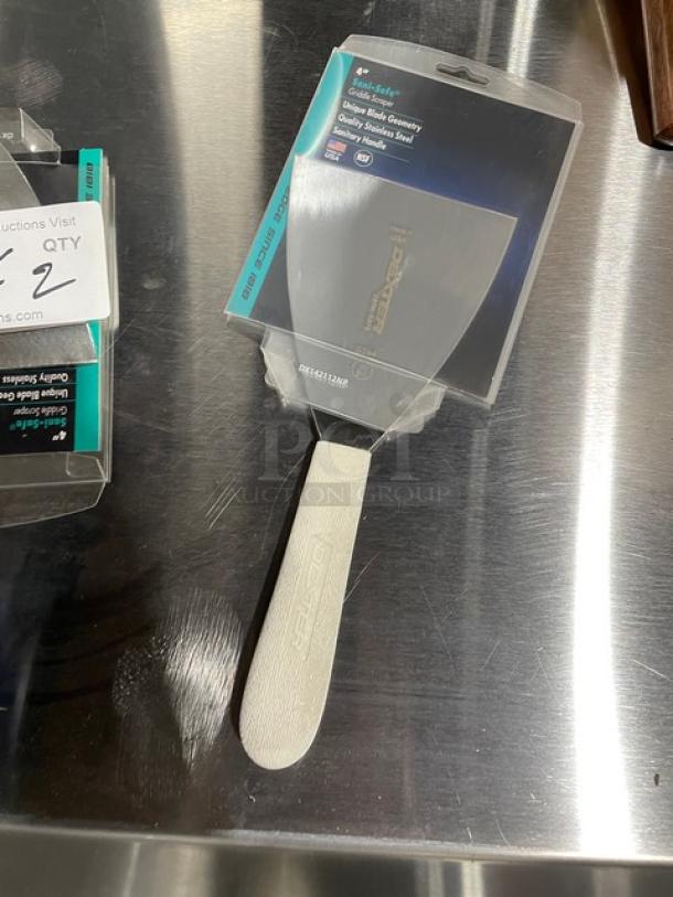 Brand new Dexter Russell Sani-Safe 4" griddle scraper, model S294, with stainless steel blade and white grip handle.