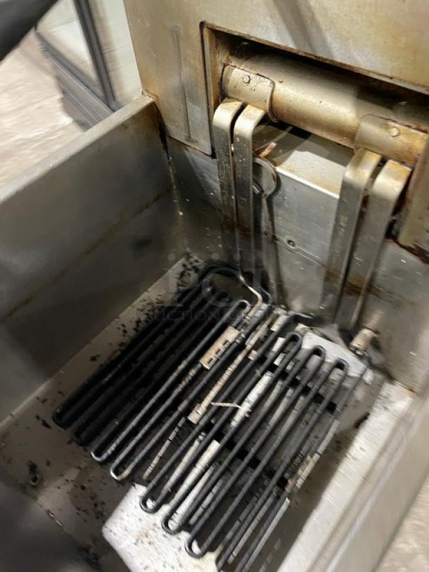 Frymaster FilterQuick Series electric fryer, model 1FQE80U0ZQTZB17. Stainless steel, touch screen, filtration system, on casters.