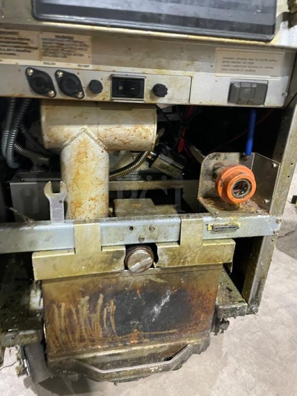 Frymaster FilterQuick Series electric fryer model 1FQE80U0ZQTZB17, stainless steel, touch screen, filtration system, on casters, worn condition.