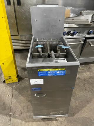 Pitco 35C+S 35 lb. stainless steel deep fat fryer, liquid propane, with backsplash and fry baskets, on legs, SN: G19BB003226.