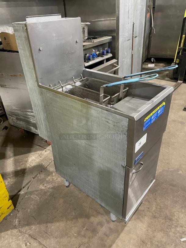 Pitco 35C+S stainless steel propane fryer, 35 lb capacity, with backsplash and fry baskets, on legs, used condition.