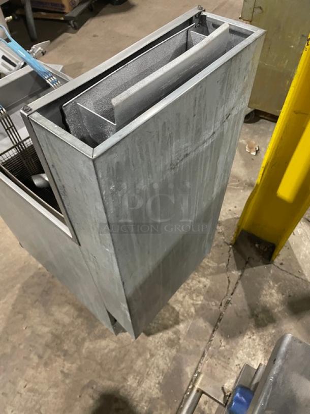 Pitco 35C+S stainless steel propane fryer, 35 lb capacity, with backsplash and fry baskets, on legs, SN: G19BB003226.