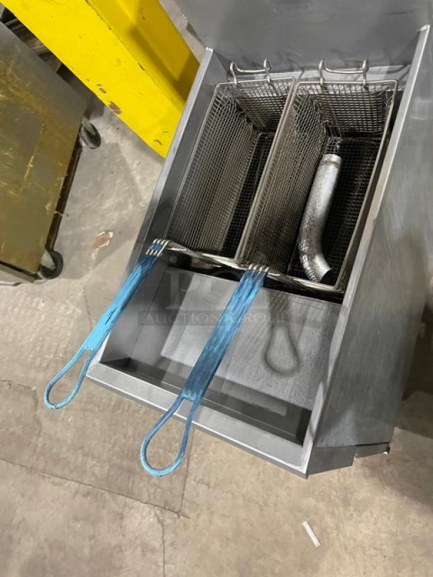 Pitco 35C+S stainless steel deep fat fryer, 35 lb capacity, liquid propane, includes backsplash and fry baskets, on legs.