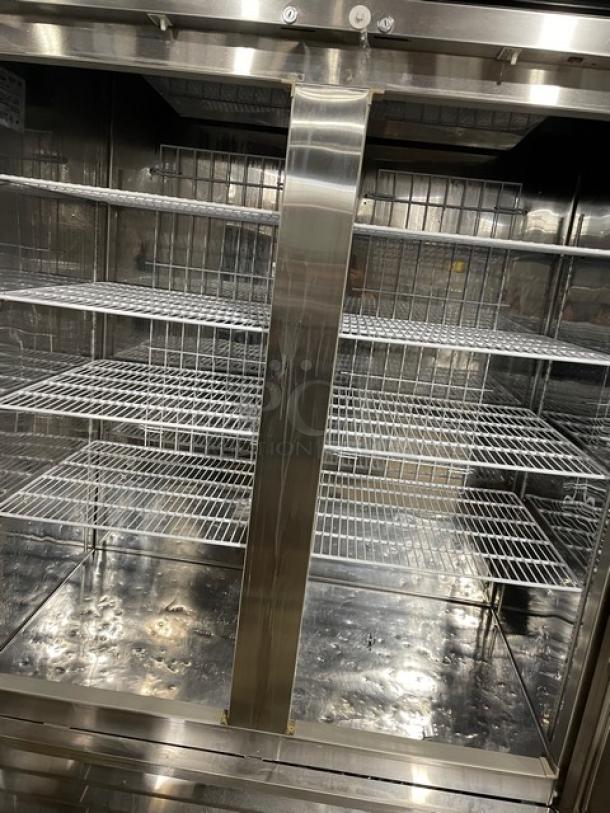 Blue Air BASF2 stainless steel 2-door reach-in freezer with poly coated wire racks, on casters, 115V 1 phase.