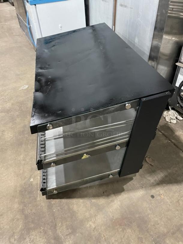 ServIt 48" 2-Tier Heated Display Case, Model 423OAM138D, countertop, slanted, black top, stainless steel sides, commercial use.