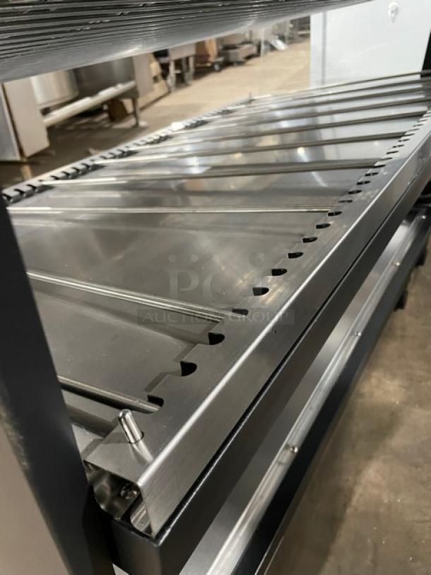 ServIt 423OAM138D countertop heated display case, 48" slanted, 2-tier, electric, stainless steel, excellent condition.