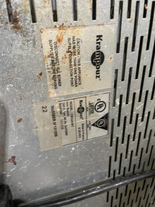 Krampouz stainless steel dual crepe maker, model CECIJ40AT, with cast iron tops, electric, 240V, 1 phase. Visible labels show model and serial number.