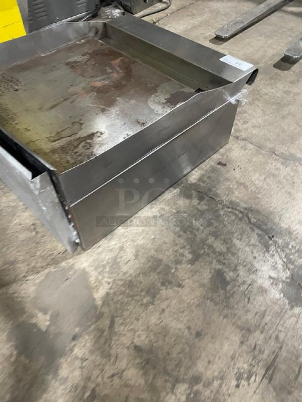 American Range stainless steel natural gas countertop flat griddle with back and side splash. Used condition.