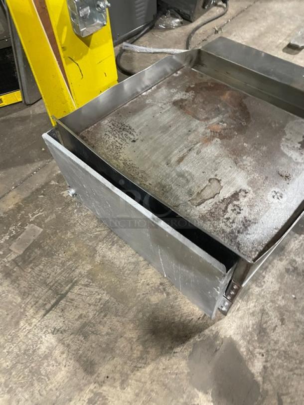 American Range stainless steel natural gas flat griddle, features back and side splash, used condition.