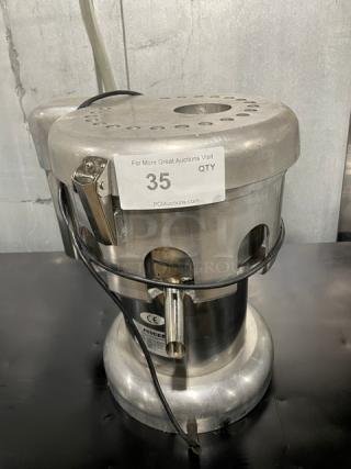 L&J WFA2000 stainless steel electric juice extractor. Countertop model, 110V, commercial use. Auction tag visible.