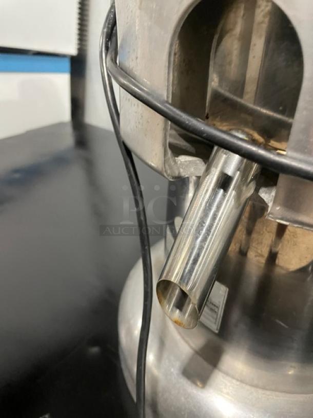 L&J Commercial Stainless Steel Electric Juice Extractor, Model WFA2000, 110V, showing spout and wiring details.