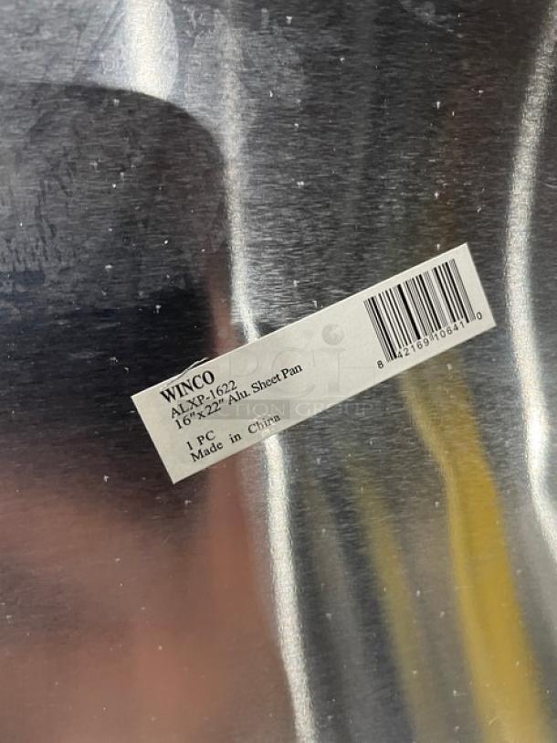 Winco ALXP1622 2/3-size aluminum sheet pan, new condition, commercial grade, 16"x22", label shows model and "Made in China".