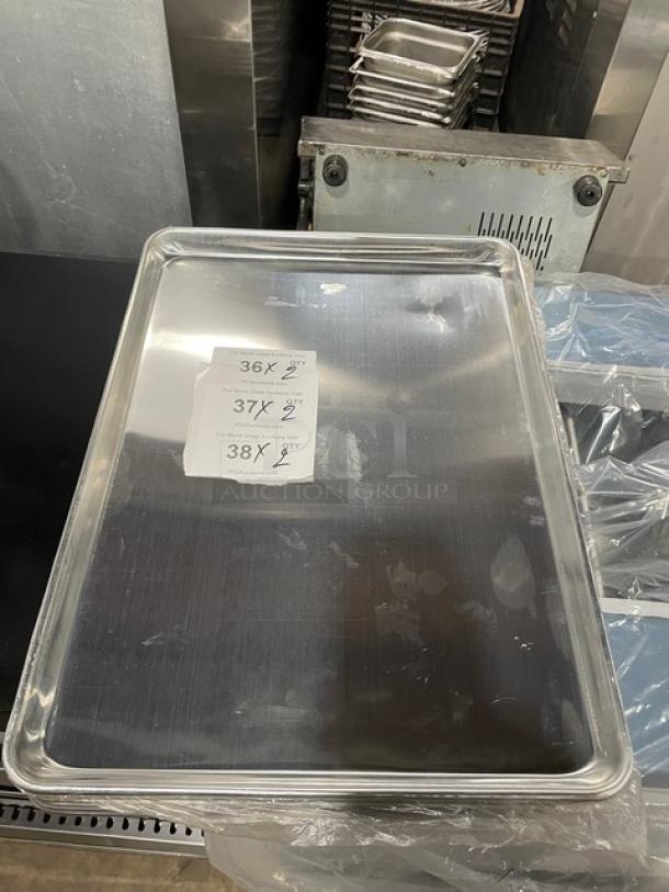 Winco Commercial Aluminum 2/3-Size Sheet Pan, Model ALXP1622, new condition, with visible size labels.