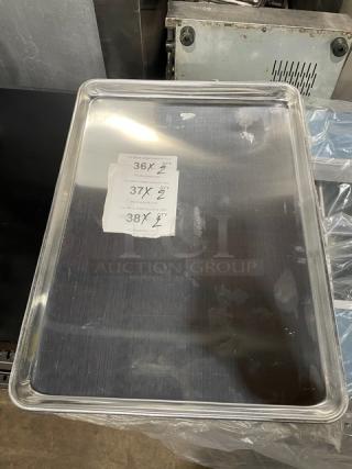 Winco ALXP1622 aluminum 2/3-size sheet pan, new condition, commercial-grade. Image shows size annotations on the surface.
