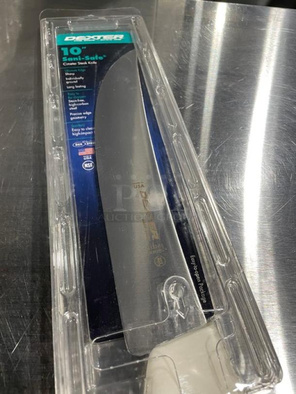 Brand new Dexter Russell Sani-Safe 10" cimeter steak knife in original packaging. Model S132-10, white grip handle.
