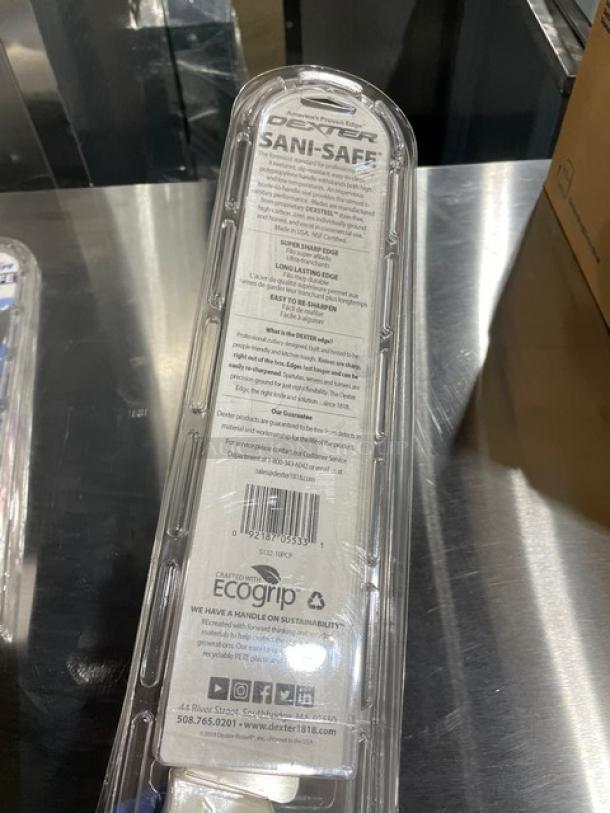 Brand new Dexter Russell Sani-Safe Series 10" cimeter steak knife, model S132-10, with a white Ecogrip handle, in packaging.