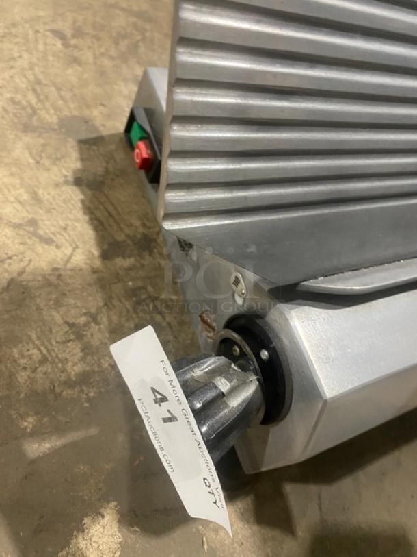 Celme electric deli meat slicer, commercial countertop model, metallic finish, visible power switch, in good condition.