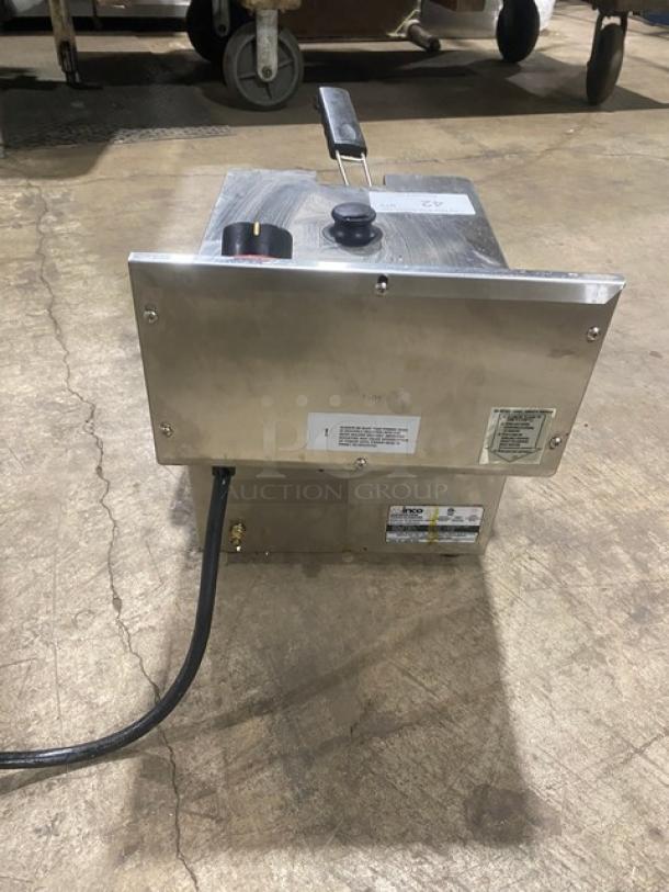 Winco EFS16 stainless steel electric countertop deep fat fryer with lid and basket, model EFS-16, 120V, SN: FS16010-012334.