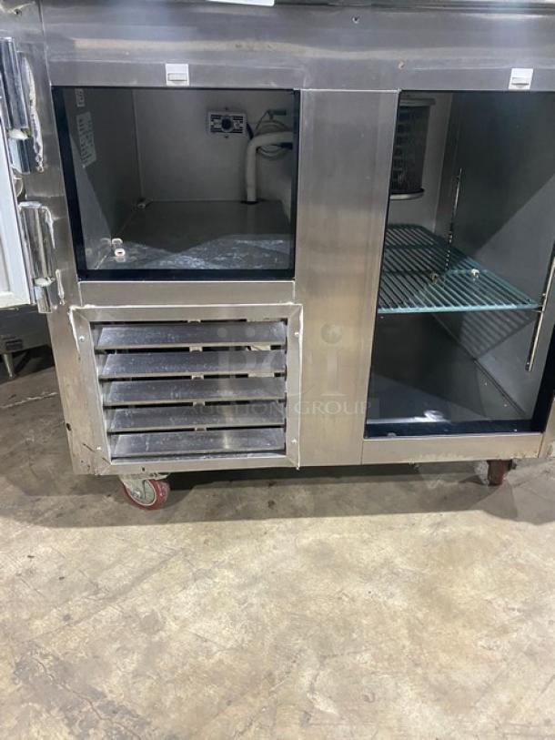 Leader LB36SC refrigerated worktop, 36" stainless steel, 1-1/2 door, poly-coated wire rack, on casters, 115V, used.