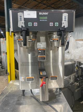 Bunn ThermoFresh Series Dual Coffee Brewer, Model DUALTFDBC, stainless steel, with hot water dispenser, digital control, on legs.