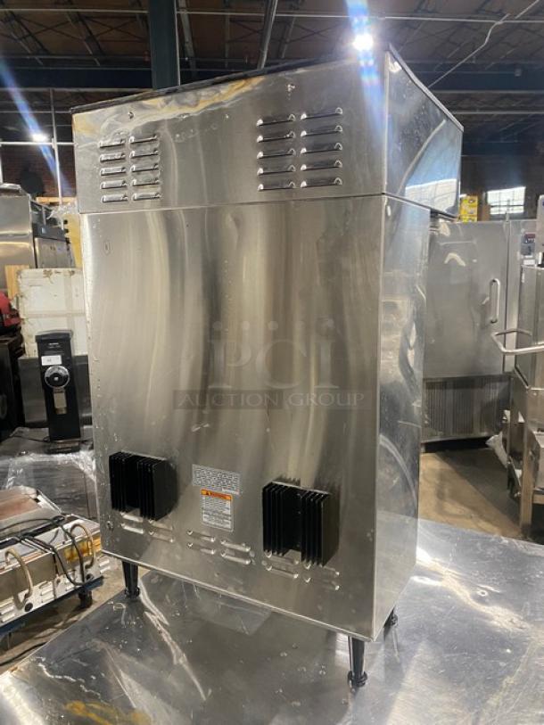 Bunn ThermoFresh Series DUALTFDBC coffee brewer with hot water dispenser, digital control, stainless steel, on legs.