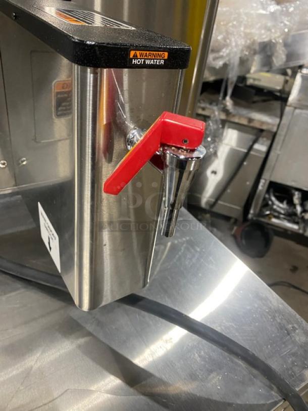 Bunn ThermoFresh Series Dual Coffee Brewer with red hot water dispenser and warning label, Model DUAL TF DBC.