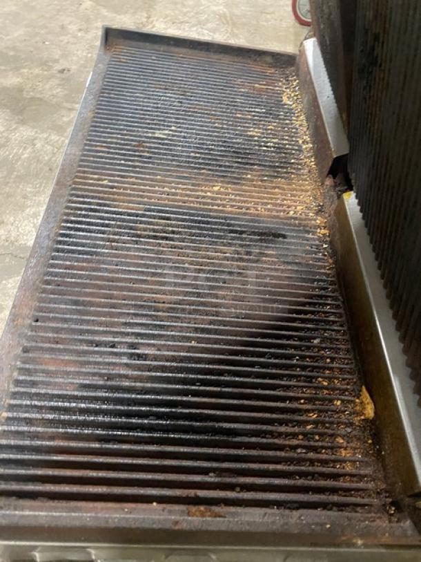 Equipex MAJESTIC stainless steel electric countertop sandwich press grill with top and bottom grooved grates, visible wear.