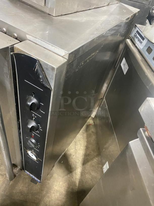 Moffat Turbofan Series stainless steel half-height heated holding cabinet, model P8M, on casters; 8-pan capacity.