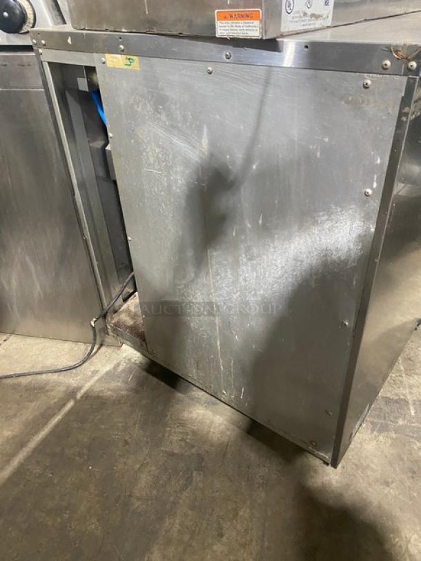 Moffat Turbofan P8M 8-Pan Heated Holding Cabinet, stainless steel, on casters, visible scuffs, electric powered, model label.