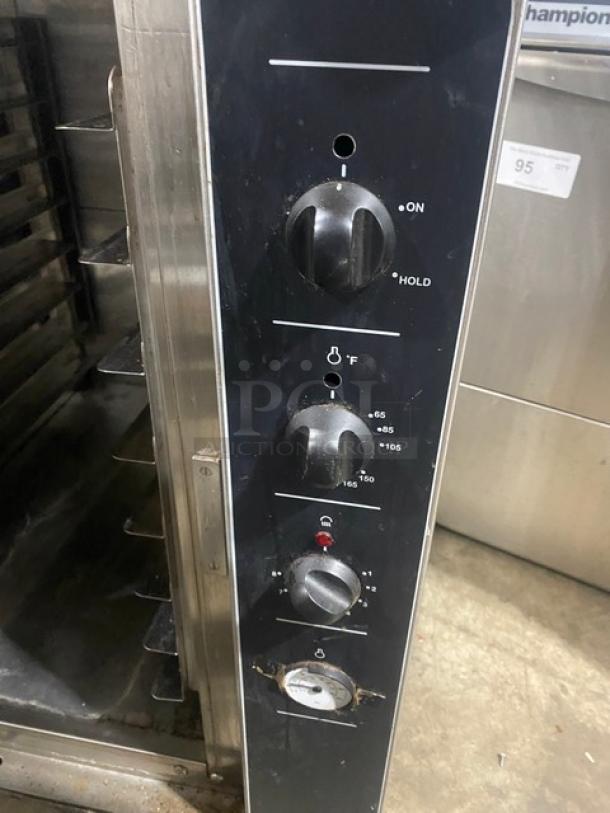 Moffat Turbofan Series P8M heated holding cabinet, stainless steel, with built-in pan slides and control panel, on casters.