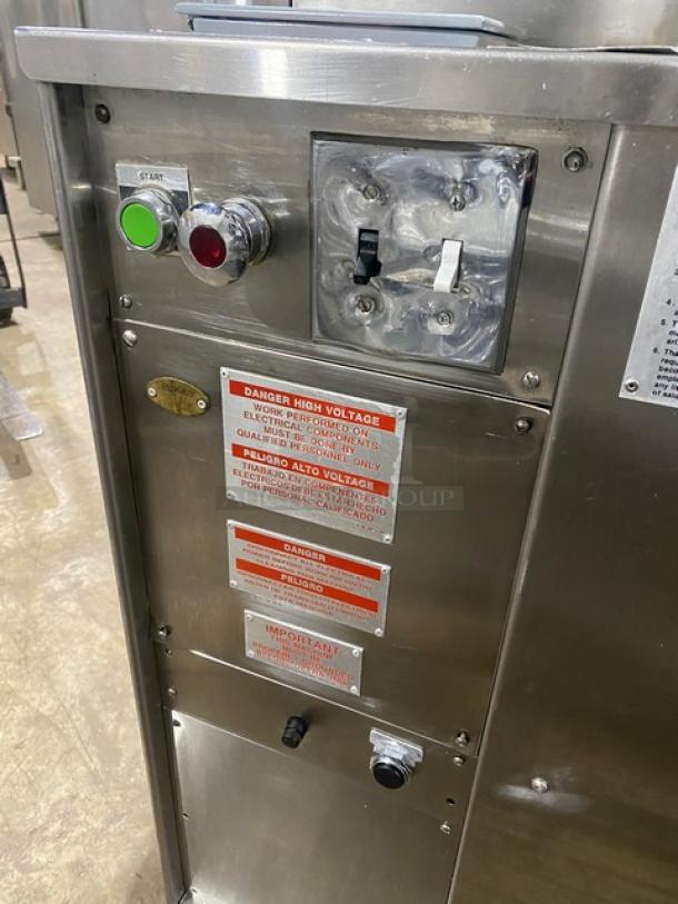 Atwood Scale-O-Matic S300 stainless steel dough divider/rounder with conveyor, 208V 3 phase, on casters, control panel visible.