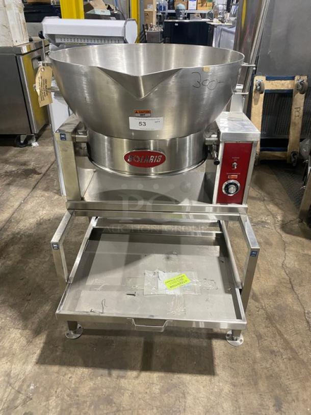 Solaris stainless steel electric 16 gal. tilting skillet, model ECTRS16, on stand. Manual tilt, 208V 3-phase, on legs.
