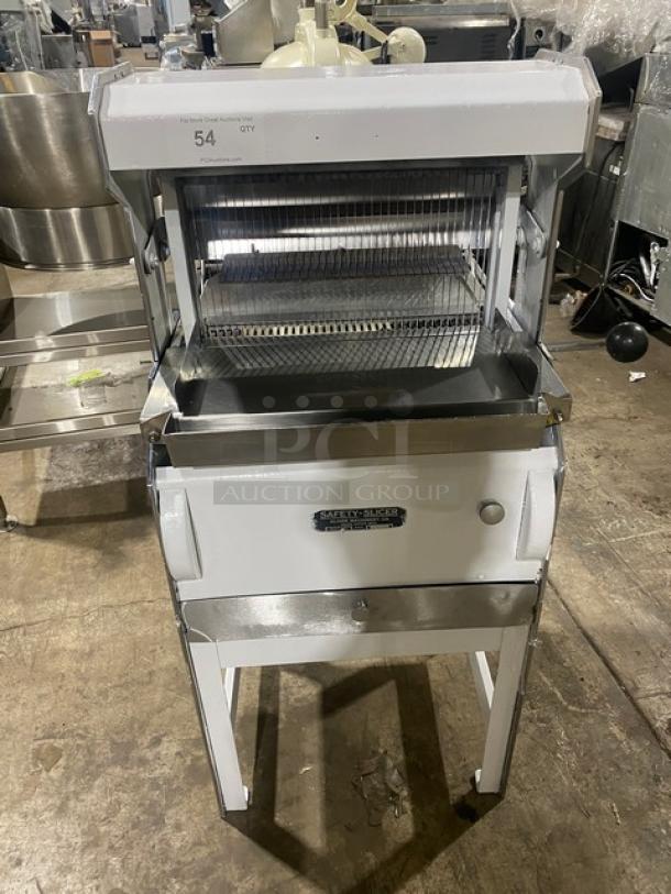 Oliver Safety-Slicer electric bread slicing machine, white with stainless steel worktop, SN: 86430, on legs.