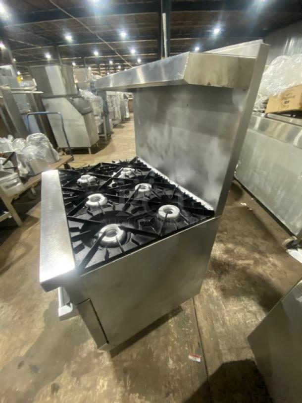 Vulcan commercial stainless steel 6-burner range/oven combo with backsplash, overhead salamander shelf, and wired oven rack.