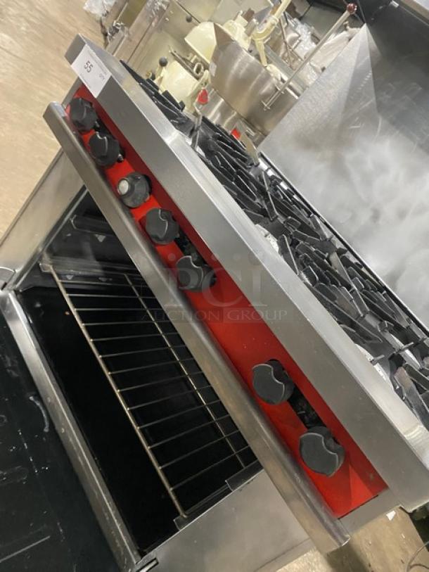 Vulcan commercial stainless steel 6-burner range/oven combo with backsplash, overhead salamander shelf, and wired oven rack.