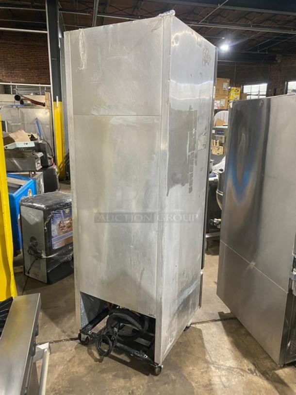 True T-23F stainless steel single-door reach-in freezer on casters, Energy Star certified, with a poly-coated wire rack.