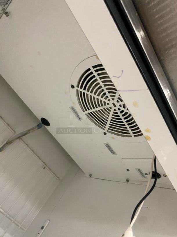 True T-23F stainless steel single door reach-in freezer, Energy Star certified, poly-coated wired rack, on casters.