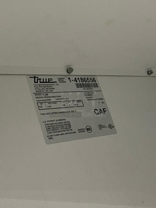 True T-23F Commercial Single Door Stainless Steel Freezer, Energy Star, 115V, single-phase, on casters, with poly-coated wired rack, Model: T-23F SN: 1-4186556.